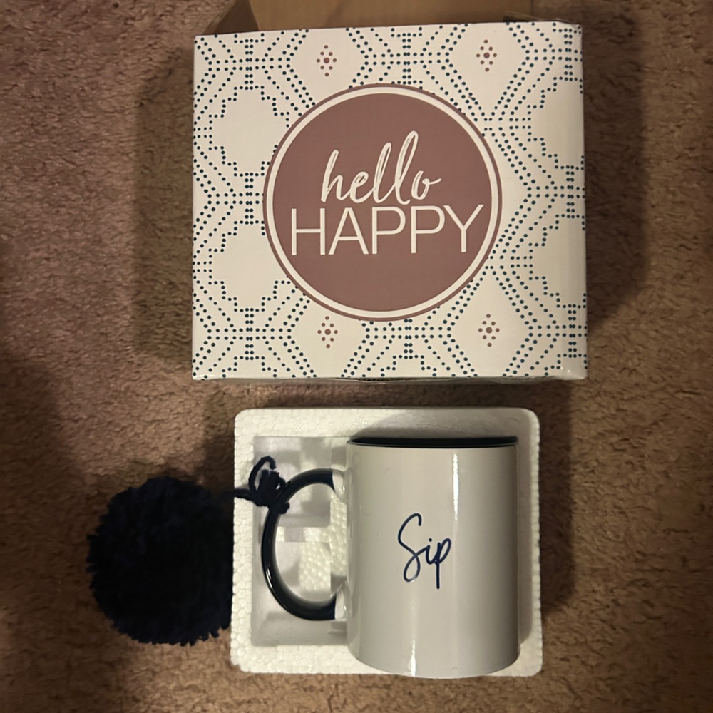 White Mug with navy Handle and 'Sip' Design